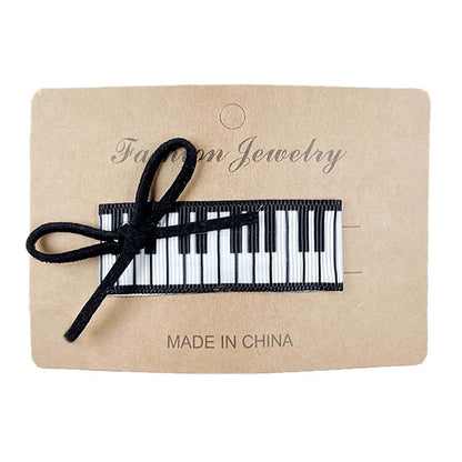 Xagmodshn Musical Note Hair Clip With Sequins And Pearls