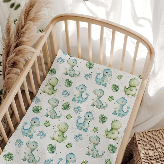 Wicbfdfv Cute Jungle Dinosaurs Fitted Baby Crib Sheet for Boys Girls 52x28Inch Blue Green Dinosaur Tropical Leaves Paws
