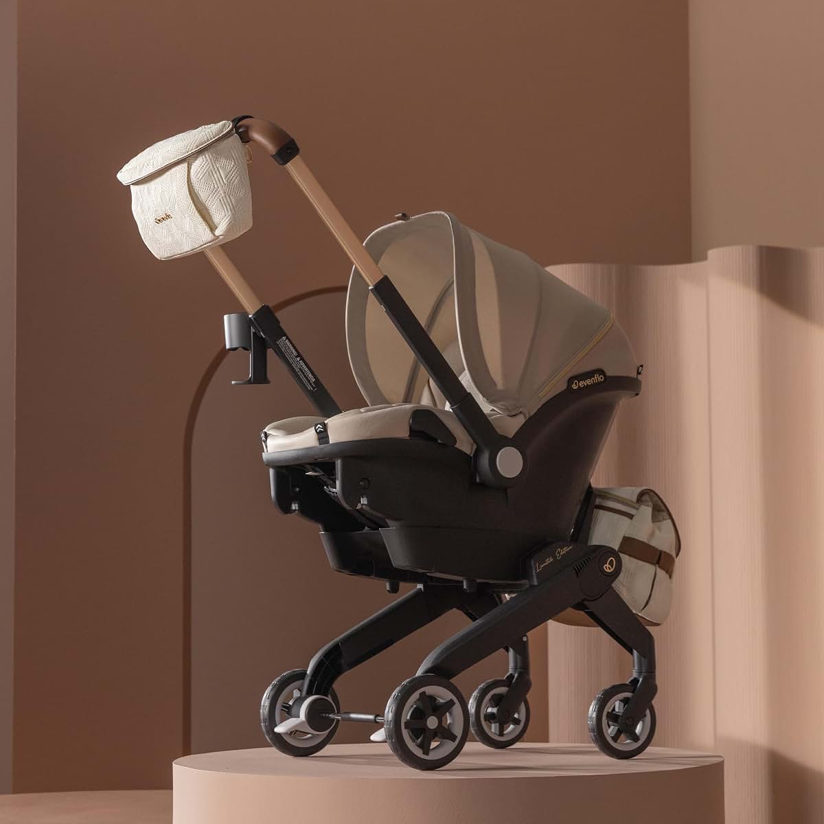 Evenflo Shyft DualRide Infant Car Seat Stroller Combo in Champagne Green & Gentle Fabric