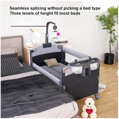 Suttonbebe Pack and Play Baby Bedside Crib, Foldable Travel Crib with Wheels and Storage Basket